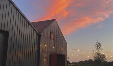 Gun Brewery & Taproom external with sunset