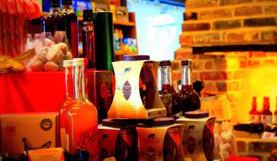 Slindon Forge drinks display, Slindon Forge village Shop inside gifts