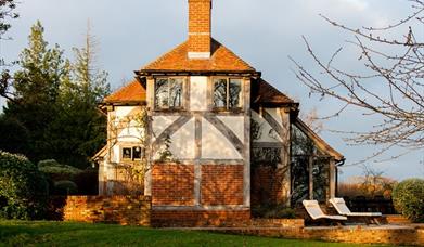 outside of a large cottage building