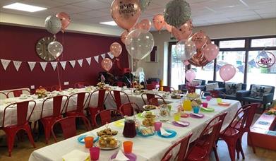 Cjs Cafe with tables set up for a birthday party