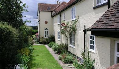 White brick building of Dairy Farm B&B