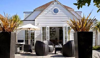 The outside of Hamptons Beach House Angmering