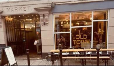 out side seating and view of the entrance of the old town market