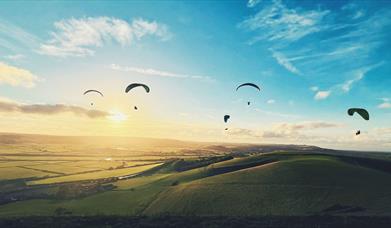 Paragliding over Mount Caburn