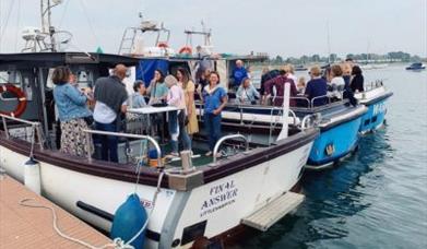 people on the harbour tour boat