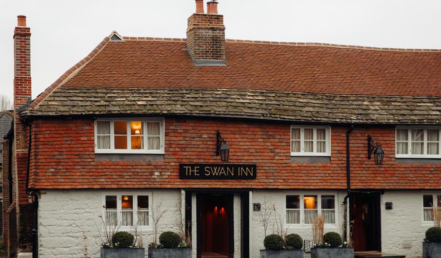 Swan Inn, fittleworth pub building with red tile roof and chimney