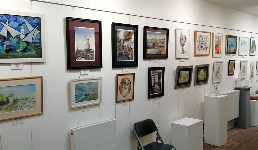 the exhibition gallery walls with loads of exhibits