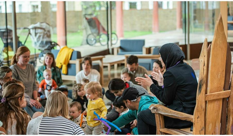 A toddler group being told a story