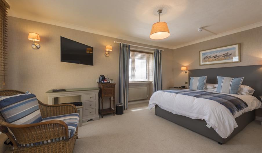 A guest bedroom at The Beachcroft Hotel
