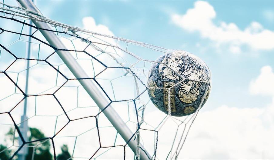 Football in the back of a net