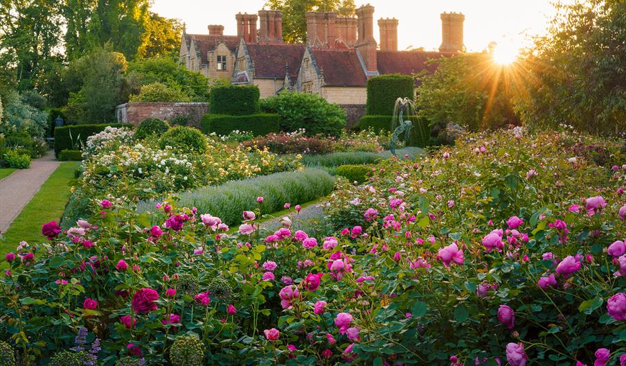 image of flower garden outside the main house