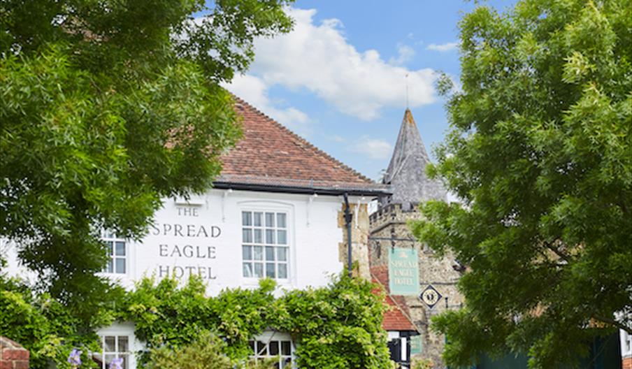 The Spread Eagle Hotel through trees