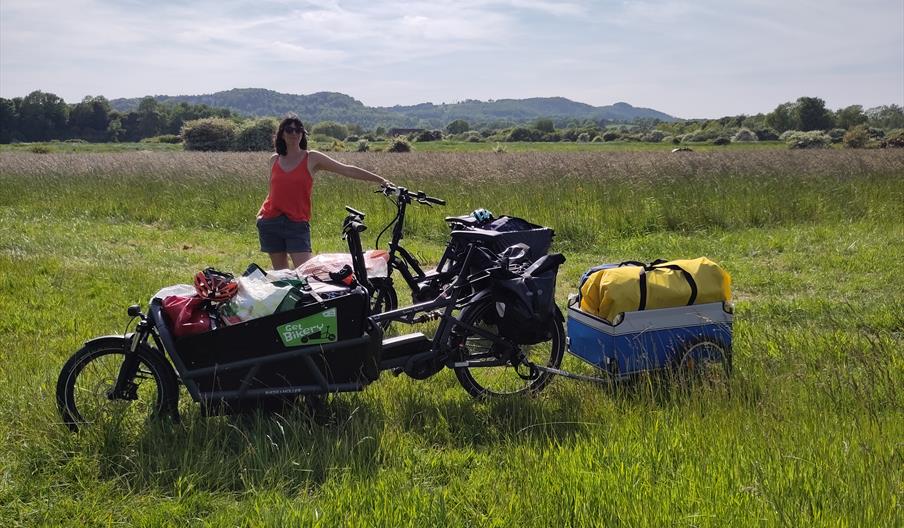 bicycle with storage front and a towable trailer