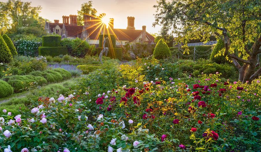 image of flower garden outside the main house