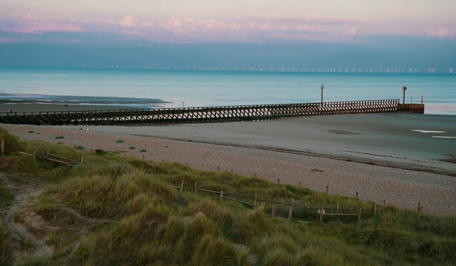 sea with the tide out taken from sand dunes on Littlehampton west beach