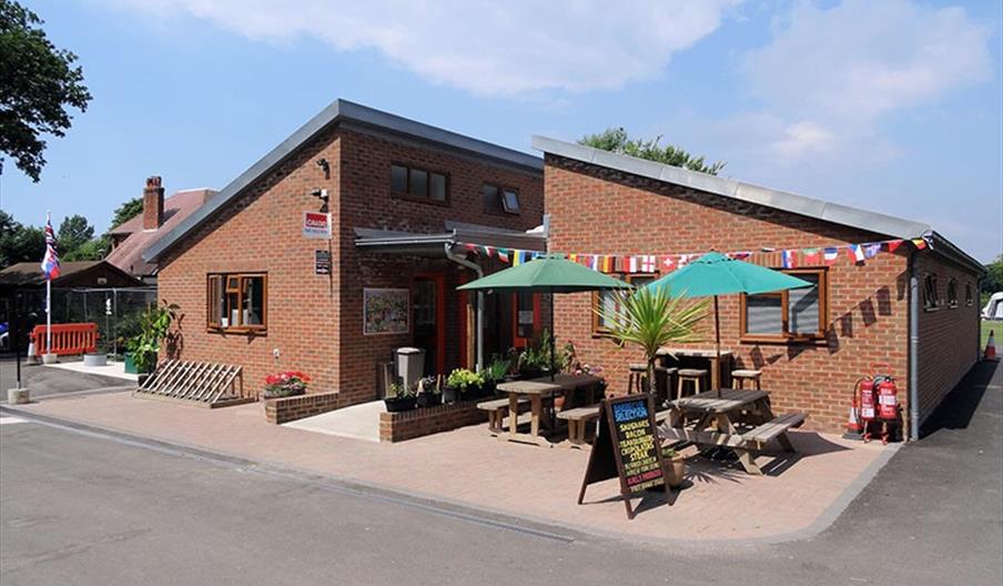 main campsite building with outside seating
