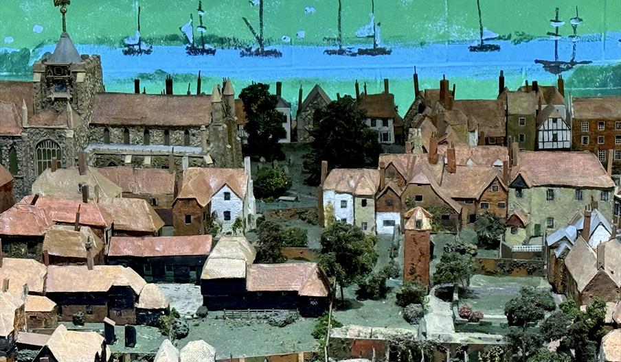 The image shows a section of the Rye Town Model illuminated as part of The Story of Rye sound and light show