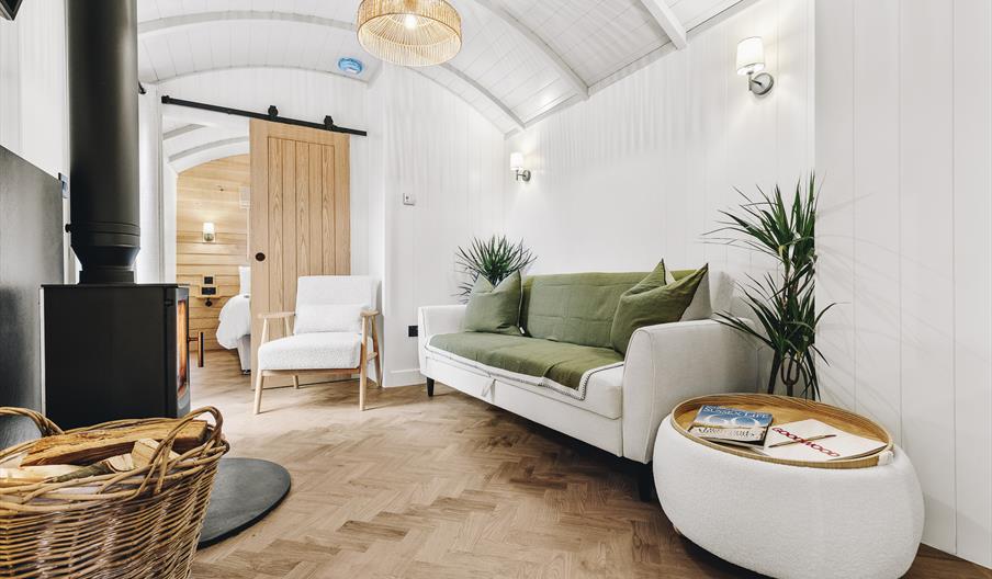 Inside of Nestled lodge with wood burner