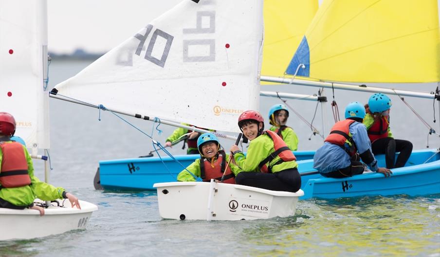 children sailing dingy