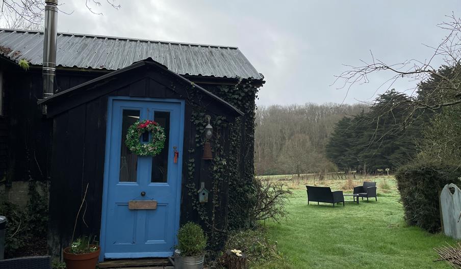 front door and gardens to the right