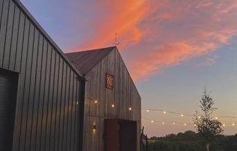 Gun Brewery & Taproom external with sunset