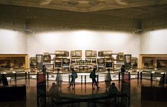 People looking at art in a museum