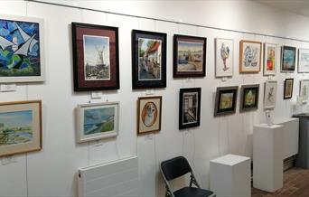 the exhibition gallery walls with loads of exhibits