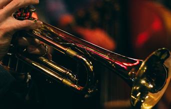 Person playing a trumpet