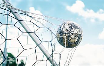 Football in the back of a net