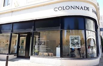 view of the entrance to Colonnade House building