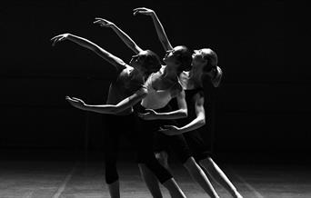 Three women ballet dancing