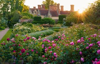 image of flower garden outside the main house