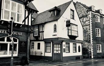 black and white image of Bull House from the street