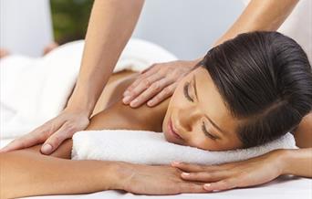 person having a back massage treatment