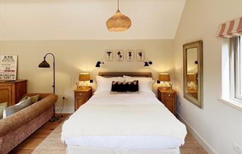 King size bed in The Potager cabin
