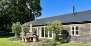 A sunny day view of the outside of a Sussex holiday cottage (2)