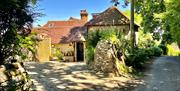 A sunny day view of the outside of a Sussex holiday cottage (5)