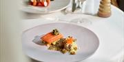 The Woodcote fine dining cuisine, featuring Duncon Mill trout and venison from the South Downs, lovingly prepared