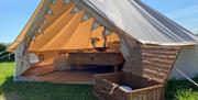 Kings Barn's glamping TP with picnic basket outside