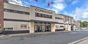 Connaught theatre external, showing a stylish wide building