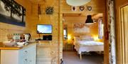 Inside of Duck Lodge showing living space and bedroom