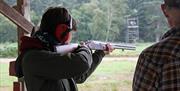 Clay pigeon shooting with instructor
