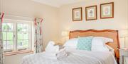 Bedroom with king size bed overlook the village green