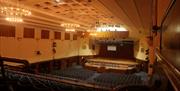 Assembly Hall worthing internal view over balcony and seating toward stage