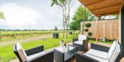 empty lodge seating over looking the vineyards