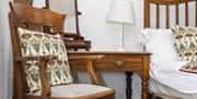 clothes chair in a bedroom