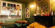 inside the lewes arms showing a cosy seating area