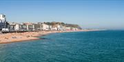 seafront at Hastings showing blue see and shingle beach