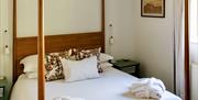 Image of Hop Cottage’s four poster bed