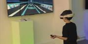 A child playing with the VR set